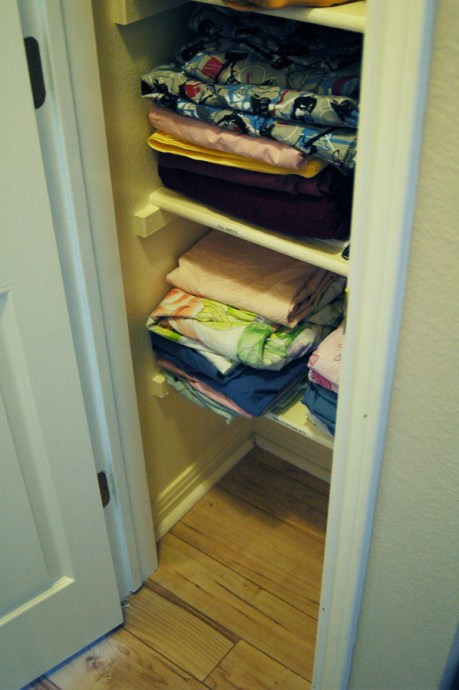 Stuffed Linen Closet - Organized Floor of Linen Closet