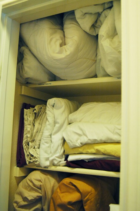 Stuffed Linen Closet - Organized Top of Linen Closet