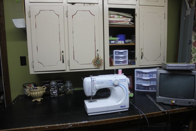 a craft room rediscovered - organized sewing counter