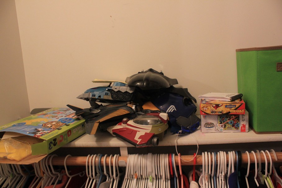 Little Boys and Their Toys - messy shelf