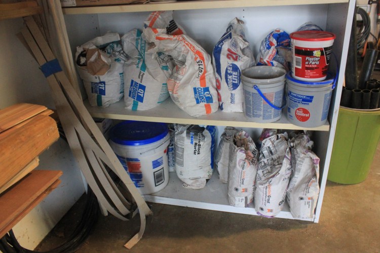 Making A Workshop Work - organized concrete bags